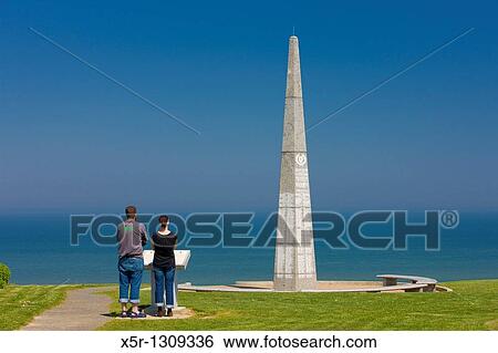 Stock Photograph - The 1st infantry division monument near Omaha Beach, Normandy, France. Fotosearch