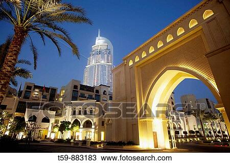 Stock Image - The Address Hotel, seen from Downtown Burj Quarter The Palace The Old Town Hotel at dusk, Dubai, United Arabian Emirates. Fotosearch