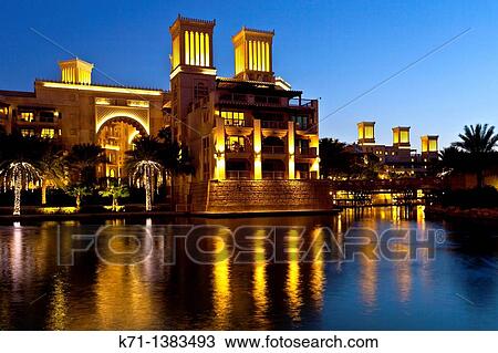 The Al Qsar hotel illuminated at night in the Madinat Jumeirah souq in Dubai, UAE View Large Photo Image Stock Image - The Al Qsar hotel illuminated at night in the Madinat Jumeirah souq in Dubai, UAE. Fotosearch