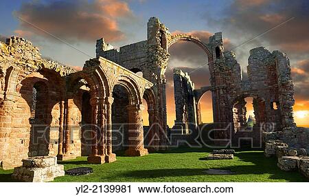 The Anglo Saxon Romanesque Abbey ruins of Holy Island, Lindisfarne, Northumbria, England. View Large Photo Image Stock Image - The Anglo Saxon Romanesque Abbey ruins of Holy Island, Lindisfarne, Northumbria, England.. Fotosearch