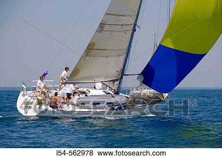 The annual sailboat race between Port Huron and Mackinaw Island requires teamwork. View Large Photo Image Stock Photo - The annual sailboat race between Port Huron and Mackinaw Island requires teamwork.. Fotosearch