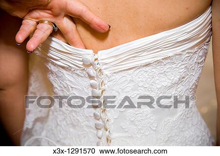 The back of the bride dress View Large Photo Image Stock Image - The back of the bride dress. Fotosearch