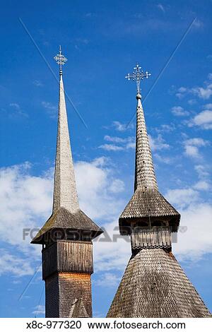 Stock Image - The Barsana monastery, maramures, Romania, was build at the end of the 20th century from wood only according to old traditions in maramures Europe, Eastern Europe, Romania, Maramures, June 2009. Fotosearch