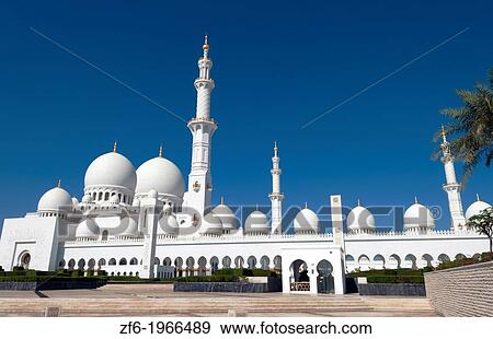 The beautiful white Sheikh Zayed Grand Mosque in Abu Dhabi in the UAE the worlds 8th largest Muslim mosque in the world. View Large Photo Image Stock Photo - The beautiful white Sheikh Zayed Grand Mosque in Abu Dhabi in the UAE the worlds 8th largest Muslim mosque in the world.. Fotosearch