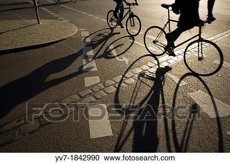 Stock Image - The? Berliner Mauerweg Road of the Berliner Wall is marked in certain areas with a doble line cobbles Berlin, Germany, Europe. Fotosearch