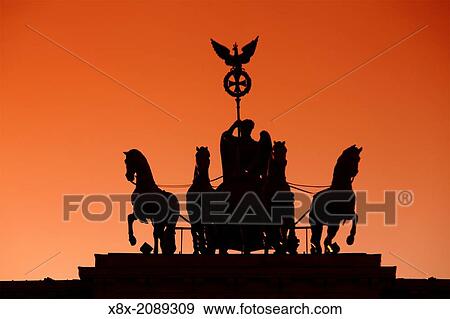 The Brandenburg Gate quadriga at sunset, Berlin, Germany. View Large Photo Image Stock Photo - The Brandenburg Gate quadriga at sunset, Berlin, Germany.. Fotosearch