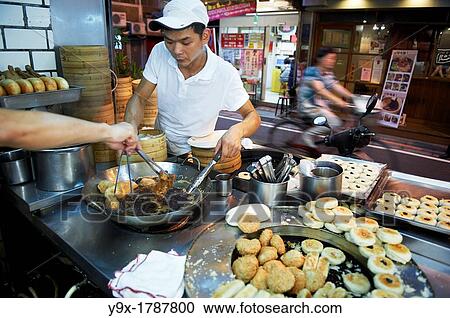 The bustling kitchen of Jin Ji Yuan or, Golden Chicken Garden, a well known dumpling house on Yongkang Street, Taipei Taiwan View Large Photo Image Stock Image - The bustling kitchen of Jin Ji Yuan or, Golden Chicken Garden, a well known dumpling house on Yongkang Street, Taipei Taiwan. Fotosearch