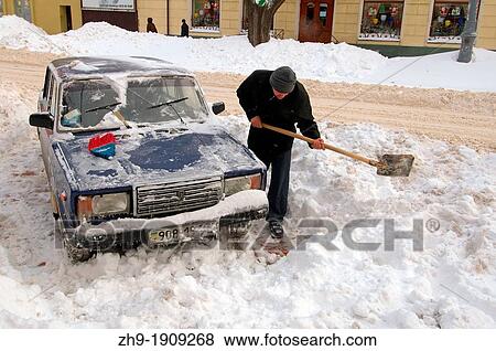 Stock Photo - The car closed by snow, Odessa, Ukraine. Fotosearch