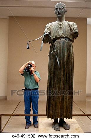 The Charioteer, bronze statue erected in 474 BC to commemorate the victory of a chariot team in the Pythian Games (which were held at Delphi) now in the Delphi Archaeological Museum, Greece View Large Photo Image Stock Image - The Charioteer, bronze statue erected in 474 BC to commemorate the victory of a chariot team in the Pythian Games (which were held at Delphi) now in the Delphi Archaeological Museum, Greece. Fotosearch