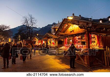 The Christmas Market in Merano, Meran. in the background the texel mountain range in the oetztal alps. Europe, Central Europe, Italy, South Tyrol, December. View Large Photo Image Picture - The Christmas Market in Merano, Meran. in the background the texel mountain range in the oetztal alps. Europe, Central Europe, Italy, South Tyrol, December.. Fotosearch