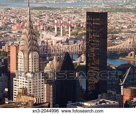The Chrysler Building and Trump World Tower, Queensboro Bridge, view from Empire State Building, Manhattan, New York City, New York, USA. View Large Photo Image Stock Photograph - The Chrysler Building and Trump World Tower, Queensboro Bridge, view from Empire State Building, Manhattan, New York City, New York, USA.. Fotosearch