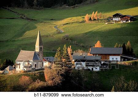 The church of Sankt Magdalena (Santa Maddalena), Villno? tal (Val di Funes), Trentino-Alto Adige, South Tyrol, Italy View Large Photo Image Stock Photo - The church of Sankt Magdalena (Santa Maddalena), Villno? tal (Val di Funes), Trentino-Alto Adige, South Tyrol, Italy. Fotosearch