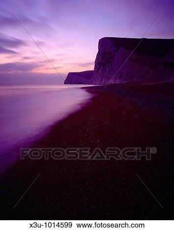 The cliffs of Bats Head and Swyre Head by Durdle Door on the Dorset Jurassic Coast, West Lulworth, Dorset, England, United Kingdom View Large Photo Image Stock Photo - The cliffs of Bats Head and Swyre Head by Durdle Door on the Dorset Jurassic Coast, West Lulworth, Dorset, England, United Kingdom. Fotosearch