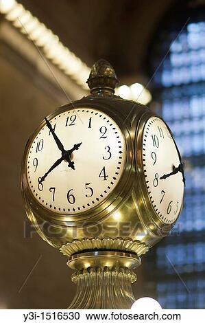 The clock on top of the information booth in Grand Central Terminal, in New York City, New York, USA. The clock, a famous meeting place, was manufactured by Seth Thomas. View Large Photo Image Stock Image - The clock on top of the information booth in Grand Central Terminal, in New York City, New York, USA. The clock, a famous meeting place, was manufactured by Seth Thomas.. Fotosearch