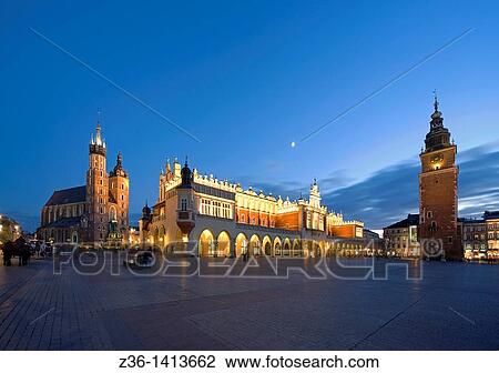 The Cloth Hall, St Mary the Virgin Basilica and Town Hall at Main Market Square at dusk, Krakow, Poland, Europe View Large Photo Image Stock Image - The Cloth Hall, St Mary the Virgin Basilica and Town Hall at Main Market Square at dusk, Krakow, Poland, Europe. Fotosearch