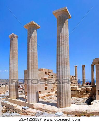 Stock Photo - The columns of the Doric Temple of Athena Lindia atop the acropolis of Lindos Greek island of Rhodes Greece. Fotosearch
