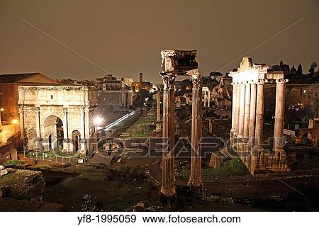 The columns of the Temple of Saturn, Arch of Septimius Severus and the medieval church in the Roman Forum, Rome, Italy. View Large Photo Image Stock Photo - The columns of the Temple of Saturn, Arch of Septimius Severus and the medieval church in the Roman Forum, Rome, Italy.. Fotosearch