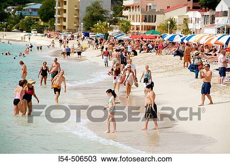 Stock Image - The cruise ship Carnival Fantasy visits the island of St. Maarten (St Martin) in the caribbean West Indies. Fotosearch