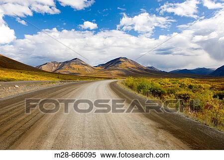 The Dempster Highway winding its way through the Ogilvie Mountains, Tombstone Territorial Park, Yukon, Canada View Large Photo Image Stock Photography - The Dempster Highway winding its way through the Ogilvie Mountains, Tombstone Territorial Park, Yukon, Canada. Fotosearch
