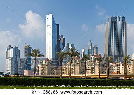 The Dubai city skyline near the Dubai Mall, UAE View Large Photo Image Stock Photograph - The Dubai city skyline near the Dubai Mall, UAE. Fotosearch