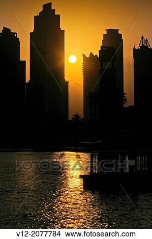 Picture - The Dubai Fountain, Dubai, United Arab Emirates at sunset. Fotosearch