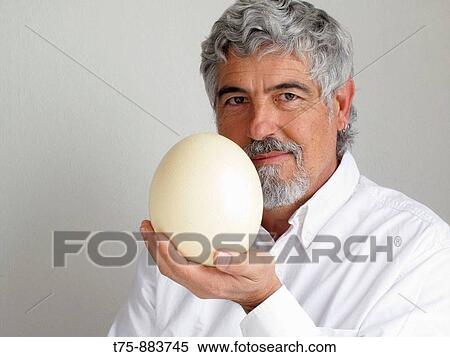 The Egg and the Man View Large Photo Image Stock Photography - The Egg and the Man. Fotosearch