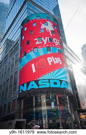 The electronic display of the NASDAQ stock exchange in New York is decorated for the IPO of the game developer Zynga The stock debuted to an underwhelming reception gaining only a few cents over the initial offering View Large Photo Image Stock Photo - The electronic display of the NASDAQ stock exchange in New York is decorated for the IPO of the game developer Zynga The stock debuted to an underwhelming reception gaining only a few cents over the initial offering. Fotosearch