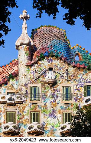Stock Image - The exterior of Casa Batllo in Barcelon, Spain. Designed by reknowned architect Antoni Gaudi,.... Fotosearch