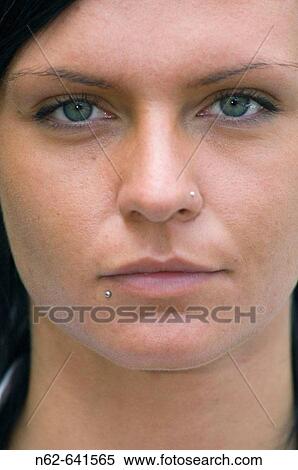 The face of a teen with blue eyes looking towards the camera View Large Photo Image Stock Photography - The face of a teen with blue eyes looking towards the camera. Fotosearch