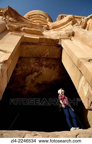 Picture - The famous and elaborately carved fa? ade of Al Deir (the Monastery), carved out of a sandstone rock face, low-angle shot. Jordan (Hashemite Kingdom of), Ma'an Governorate (Maan), ancient city of Petra. Model Released.. Fotosearch