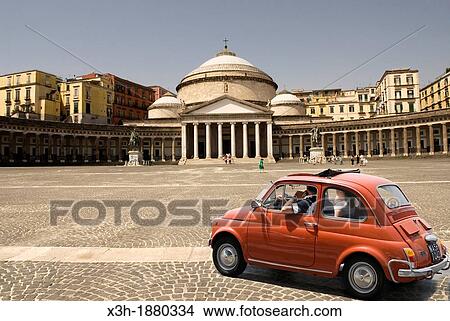 Picture - the famous Fiat 500 in front of the San Francesco di Paola Basilica, Plebiscito Square, Naples, Campania region, southern Italy, Europe. Fotosearch