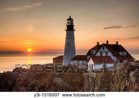 The first rays of sun after sunrise reach the Portland Head Light, built in 1791, which protects mariners entering Casco Bay. The lighthouse is located in Fort Williams Park, Cape Elizabeth, Maine, USA. View Large Photo Image Stock Photo - The first rays of sun after sunrise reach the Portland Head Light, built in 1791, which protects mariners entering Casco Bay. The lighthouse is located in Fort Williams Park, Cape Elizabeth, Maine, USA.. Fotosearch