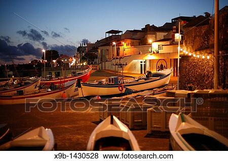 The fishing harbour of Vila Franca do Campo at dusk Sao Miguel island, Azores islands, Portugal View Large Photo Image Stock Photo - The fishing harbour of Vila Franca do Campo at dusk Sao Miguel island, Azores islands, Portugal. Fotosearch