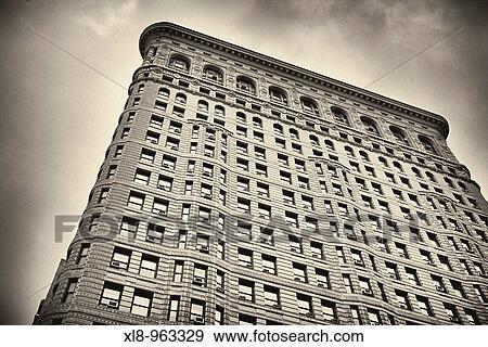 The Flat Iron building facade in Manhattan, New York, New York, USA View Large Photo Image Stock Photo - The Flat Iron building facade in Manhattan, New York, New York, USA. Fotosearch