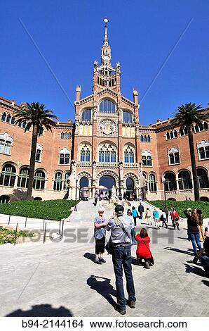 The former Hospital de la Santa Creu i Sant Pau, Hospital of the Holy Cross and Saint Paul in the neighborhood of El Guinard?, is a complex built between 1901 and 1930, designed by the Catalan modernist architect Llu's Dom? nech i Montaner. UNESCO World He View Large Photo Image Picture - The former Hospital de la Santa Creu i Sant Pau, Hospital of the Holy Cross and Saint Paul in the neighborhood of El Guinard?, is a complex built between 1901 and 1930, designed by the Catalan modernist architect Llu's Dom? nech i Montaner. UNESCO World He. Fotosearch