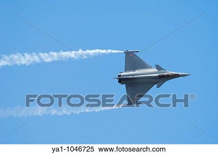 The french jet fighter Dassault Rafale B, a twin engined delta wing highly agile multi role fighter aircraft designed and built by Dassault Aviation. Paris Le Bourget airshow 2009 View Large Photo Image Stock Photography - The french jet fighter Dassault Rafale B, a twin engined delta wing highly agile multi role fighter aircraft designed and built by Dassault Aviation. Paris Le Bourget airshow 2009. Fotosearch