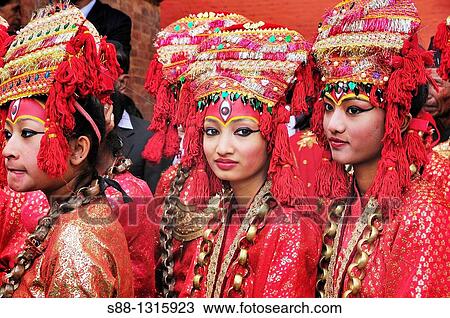 The girls dressed up traditional style during Indra Jatra festival View Large Photo Image Stock Image - The girls dressed up traditional style during Indra Jatra festival. Fotosearch