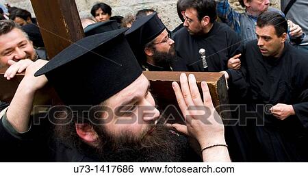 Stock Photograph - The Good Friday procession in the old city of Jerusalem. Fotosearch