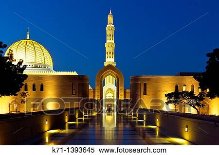 Stock Photography - The Grand Mosque illuminated at night in Muscat, Oman. Fotosearch