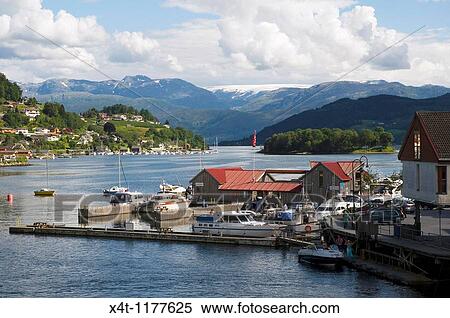 The guest harbour in the town of Norheimsund, Western Norway, on the Hardanger Fjord View Large Photo Image Stock Photography - The guest harbour in the town of Norheimsund, Western Norway, on the Hardanger Fjord. Fotosearch