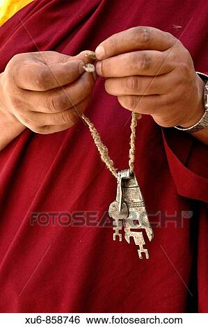 The hands of a buddhist monk holding keys to the monastery Hemis, Ladakh, India View Large Photo Image Stock Photograph - The hands of a buddhist monk holding keys to the monastery Hemis, Ladakh, India. Fotosearch