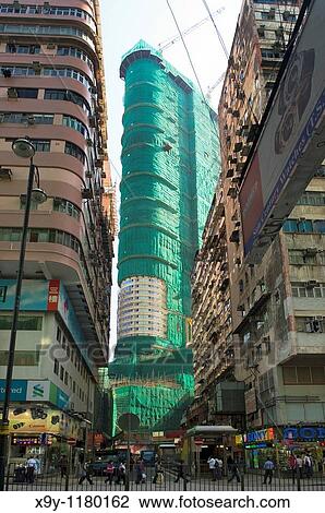 The Hanoi Road high rise project under construction, bamboo scaffolding, in the Tsim Sha Tsui area of Kowloon, Hong Kong, China View Large Photo Image Stock Image - The Hanoi Road high rise project under construction, bamboo scaffolding, in the Tsim Sha Tsui area of Kowloon, Hong Kong, China. Fotosearch
