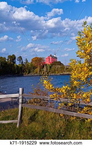 The historic Marquette Harbor Lighthouse on the shores of Lake Superior at Marquette, Michigan, USA View Large Photo Image Stock Photo - The historic Marquette Harbor Lighthouse on the shores of Lake Superior at Marquette, Michigan, USA. Fotosearch