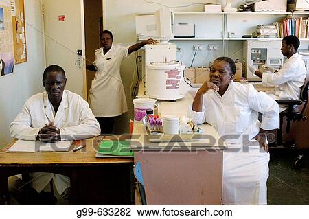 The Howard Hospital Laboratory staff are busy and use fairly modern lab equipment. This day the department is waiting for a Swedish donation of a new chemical analyzer. The Howard Hospital is a Salvation Army facily based at Concession, Zimbabwe. View Large Photo Image Stock Image - The Howard Hospital Laboratory staff are busy and use fairly modern lab equipment. This day the department is waiting for a Swedish donation of a new chemical analyzer. The Howard Hospital is a Salvation Army facily based at Concession, Zimbabwe.. Fotosearch