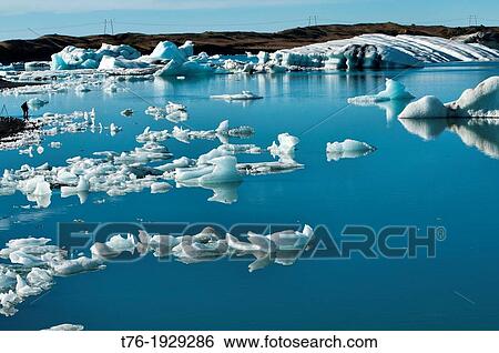 Stock Photograph - The iceberg lagoon at Jokulsarlon in Vatnajokull National Park, Iceland. Fotosearch