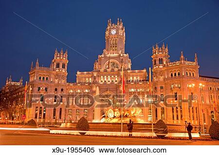 the illuminated former post office Palacio de Comunicaciones or Palacio de Cibeles on Plaza de Cibeles, Madrid, Spain, Europe. View Large Photo Image Stock Photography - the illuminated former post office Palacio de Comunicaciones or Palacio de Cibeles on Plaza de Cibeles, Madrid, Spain, Europe.. Fotosearch