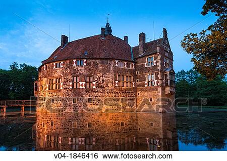 The illuminated moated castle of Vischering, Luedinghausen, North Rhine-Westphalia, Germany, Europe View Large Photo Image Stock Photograph - The illuminated moated castle of Vischering, Luedinghausen, North Rhine-Westphalia, Germany, Europe. Fotosearch