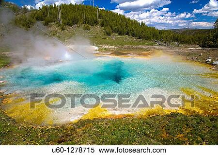Stock Photography - The Imperial Hot Spring near the Midway Geyser Basin at Yellowstone National Park, Wyoming. Fotosearch