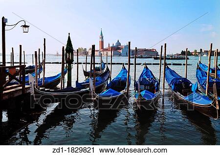 The Island of San Giorgio Maggiore with Venetian Gondolas in the foreground View Large Photo Image Stock Image - The Island of San Giorgio Maggiore with Venetian Gondolas in the foreground. Fotosearch