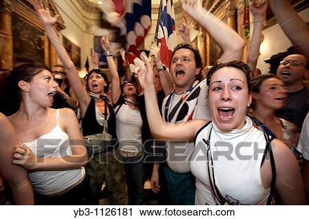 Stock Image - The Istrice Contrada celebrate winning the July 2008 Palio in the Provenzano Church, Siena, Italy. Fotosearch